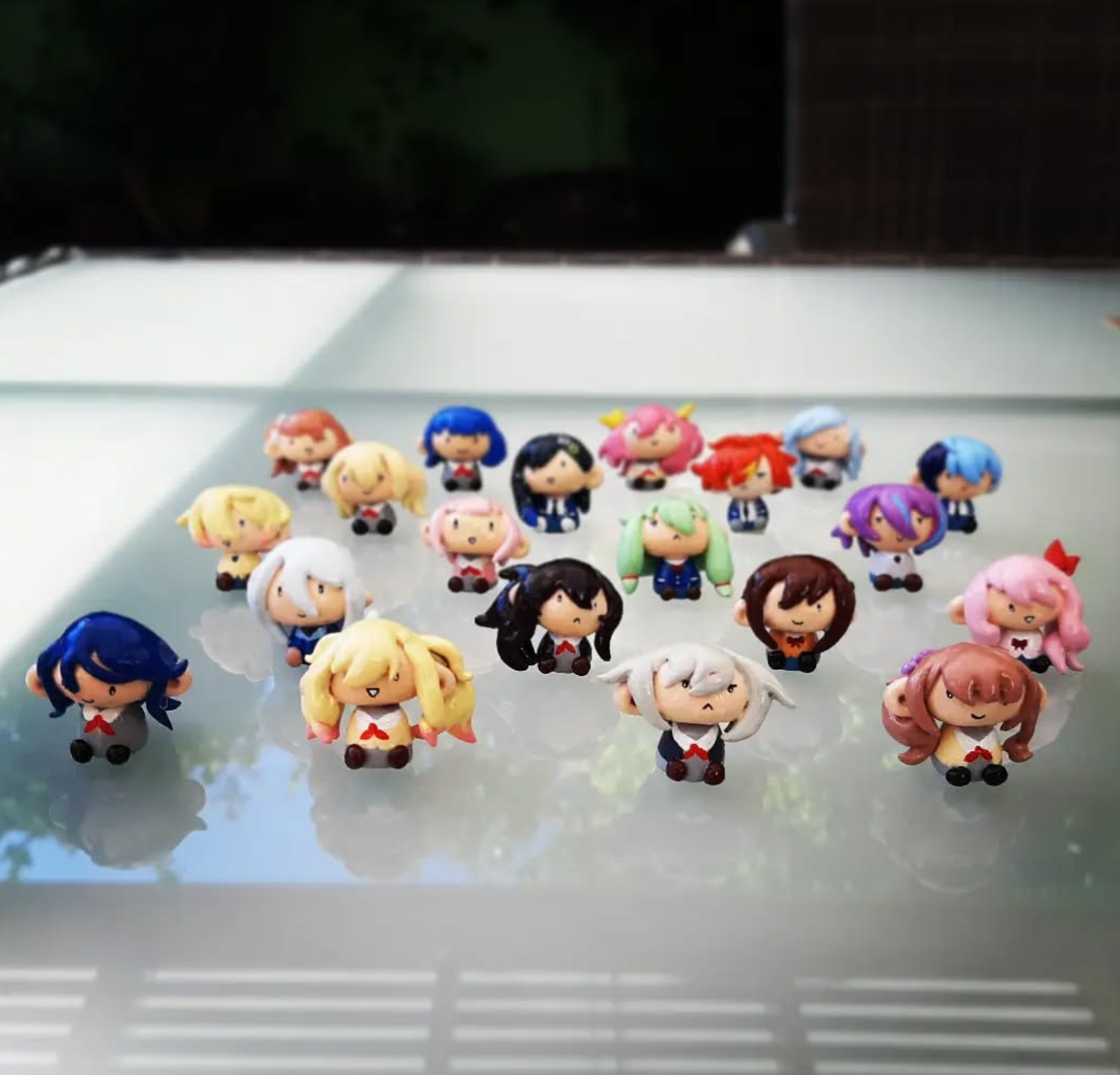 Epoxy putty figurines of Project Sekai characters.