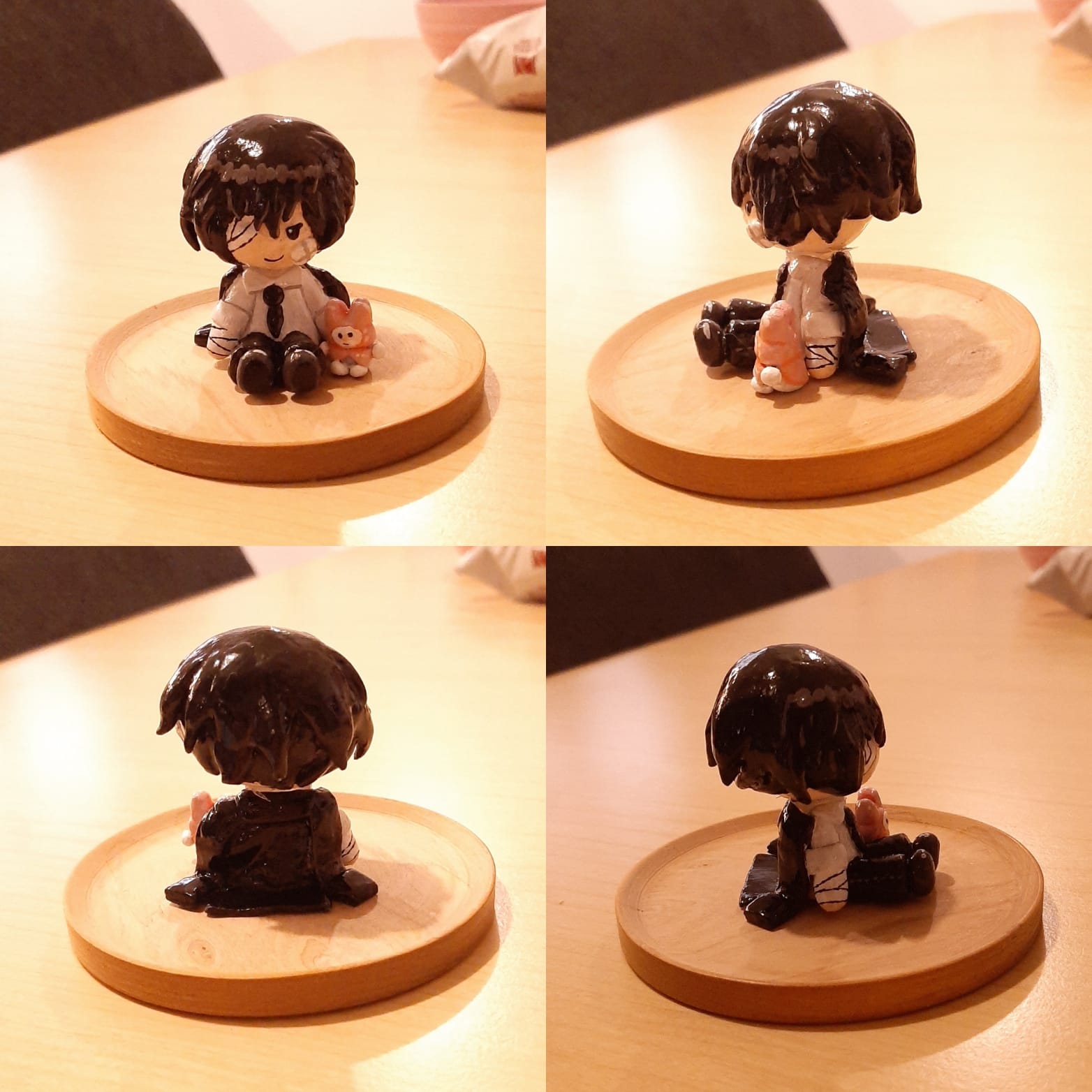 Epoxy putty chibi figurine of Osamu Dazai (fifteen version) with a My Melody plushie.